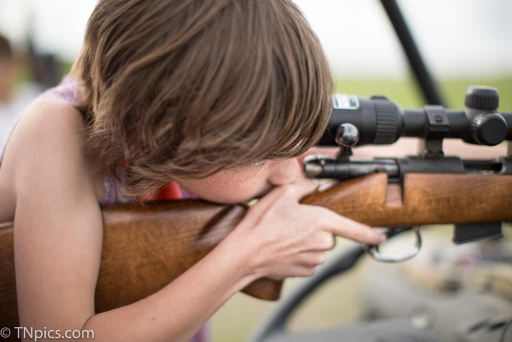North Dakota girl shooting a rifle the first time